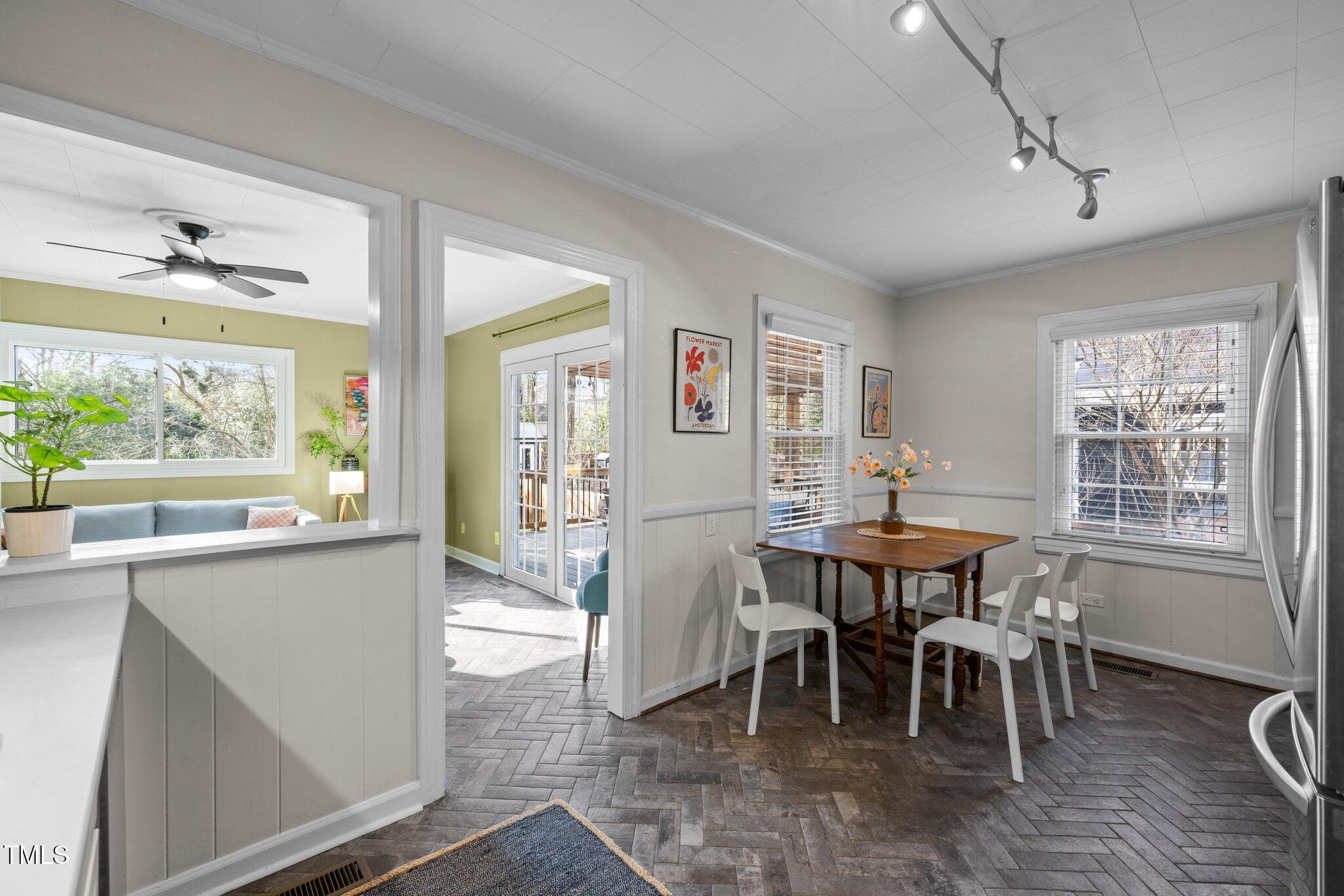 2511 State Street Durham, NC 27704 - Photo 11 of 45 a view of a dining room with furniture window and wooden floor
