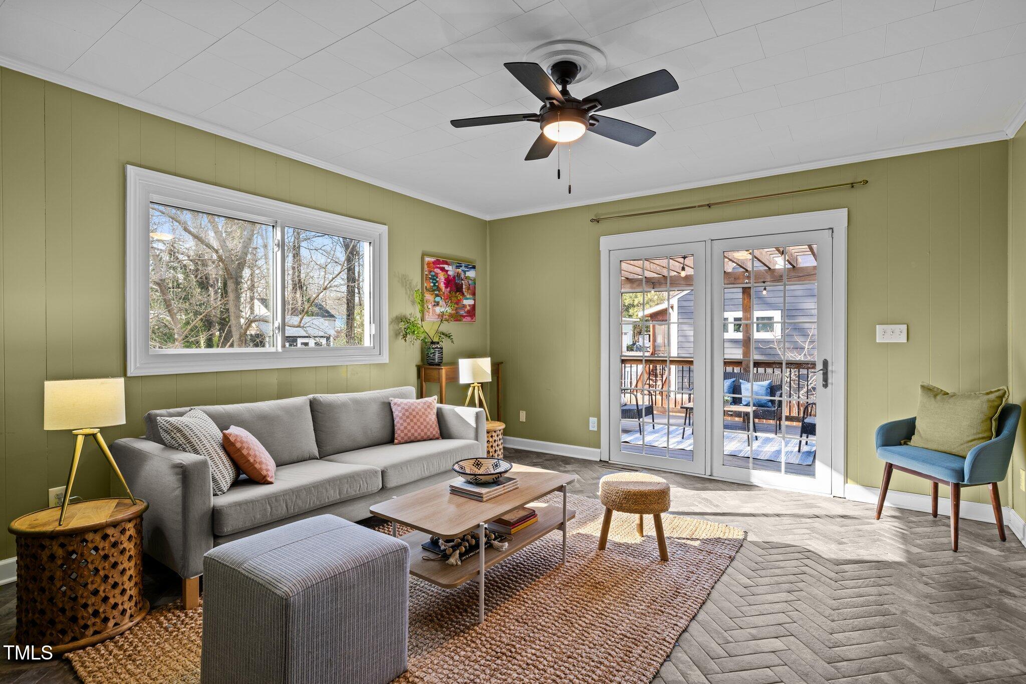 2511 State Street Durham, NC 27704 - Photo 16 of 45 a living room with furniture and a large window