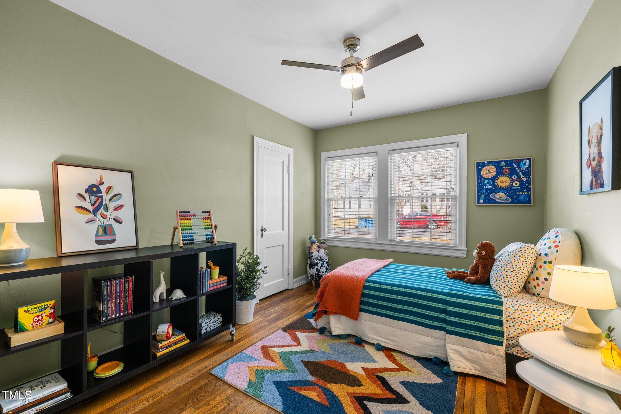 2511 State Street Durham, NC 27704 - Photo 22 of 45 a bedroom with furniture and a window
