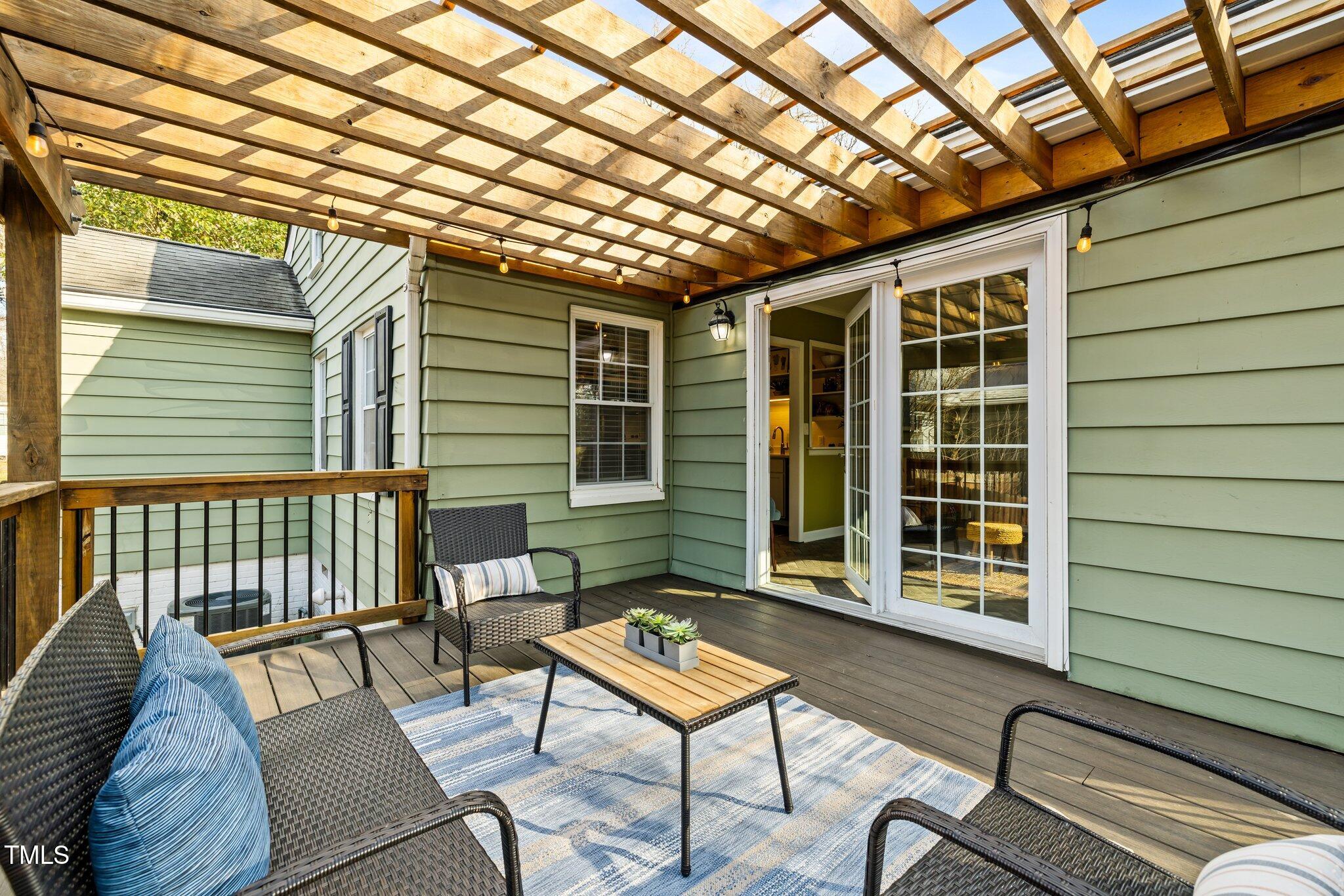 2511 State Street Durham, NC 27704 - Photo 31 of 45 a backyard of a house with barbeque oven table and chairs