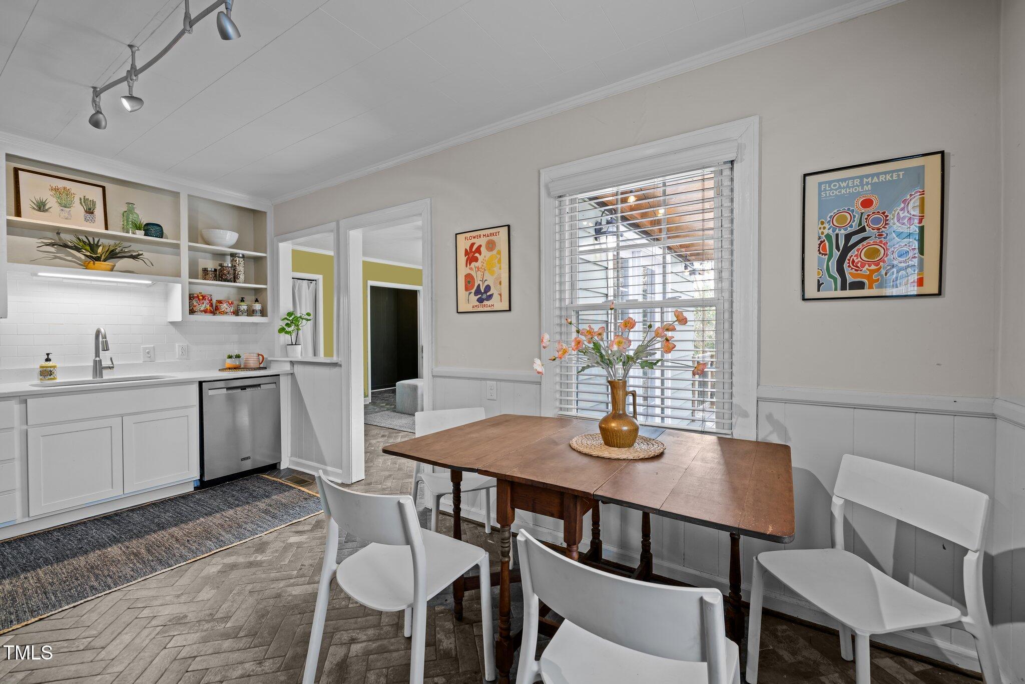 2511 State Street Durham, NC 27704 - Photo 6 of 45 a view of a dining room with furniture and wooden floor