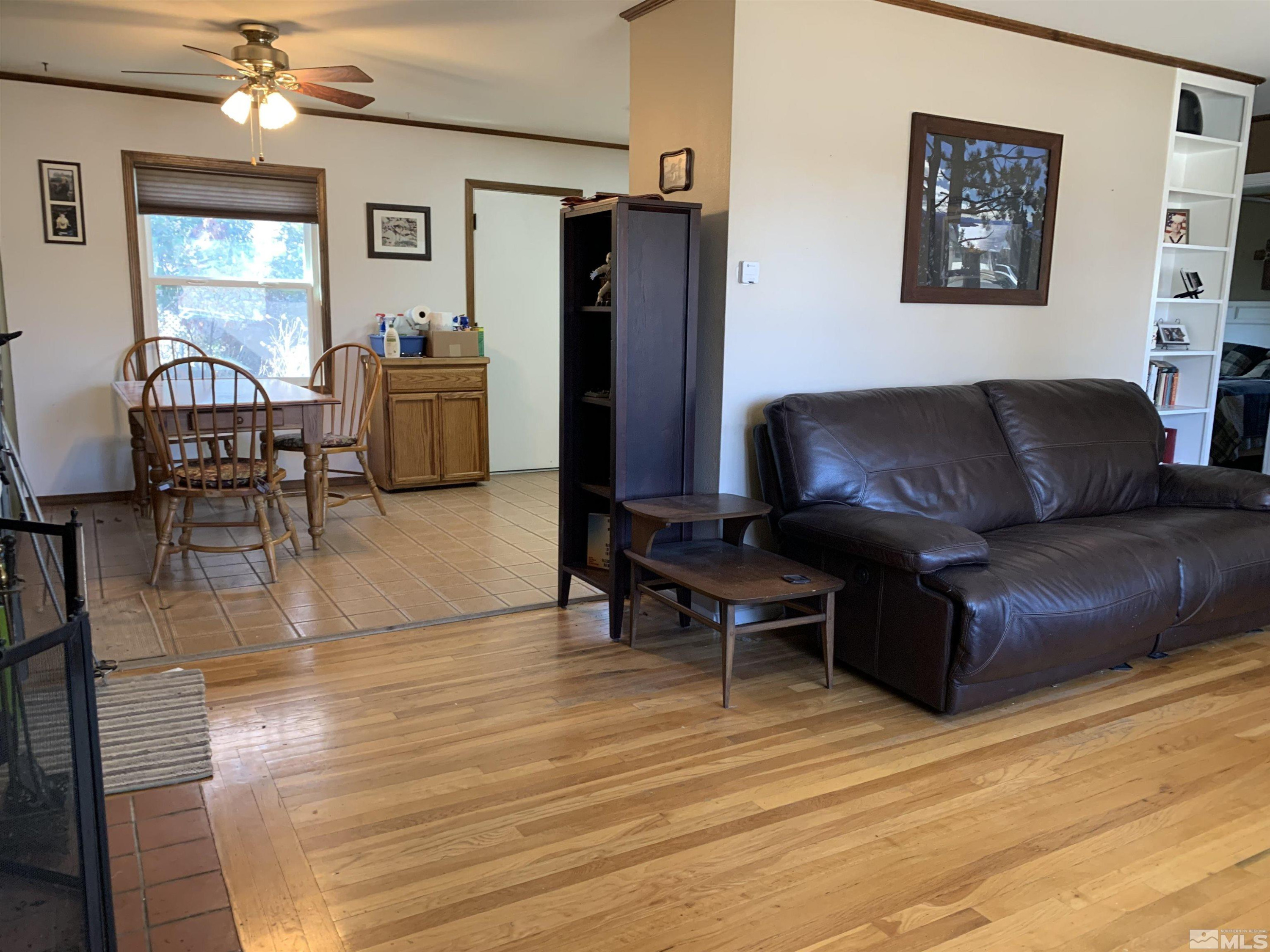 895 Lodge Avenue Reno, NV 89503 - Photo 2 of 28 a living room with furniture and a wooden floor