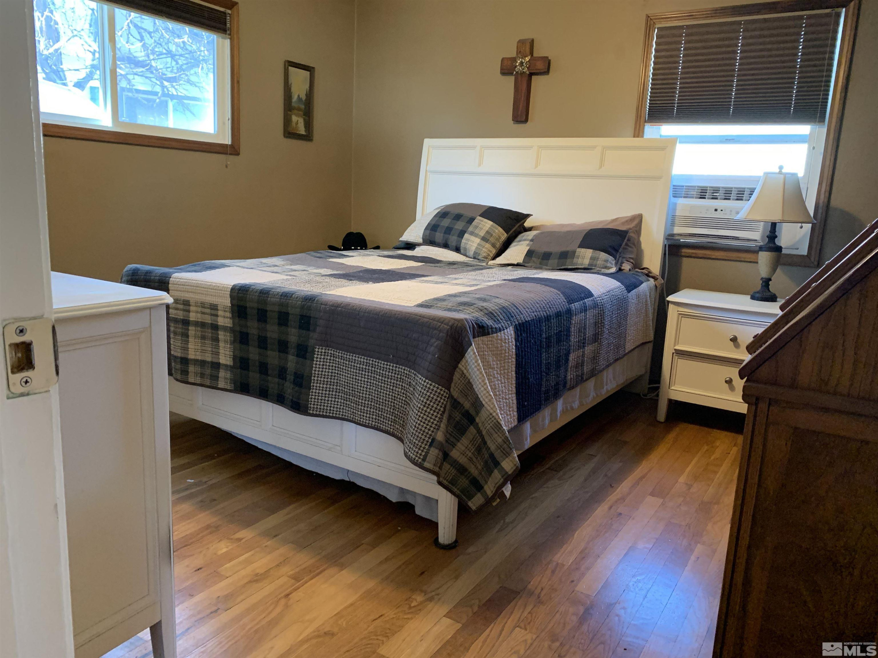 895 Lodge Avenue Reno, NV 89503 - Photo 8 of 28 a bedroom with a bed and a window