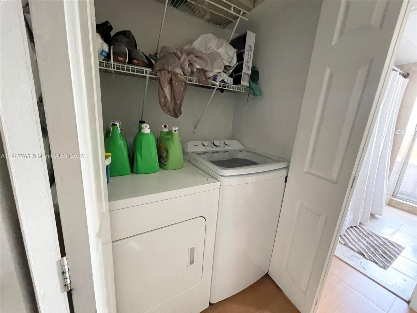 9301 Southwest 4th Street, Unit 224C Miami, FL 33174 - Photo 12 of 19 a utility room with a shower and washer