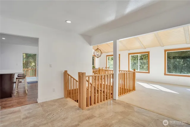 workspace with wooden floor and windows