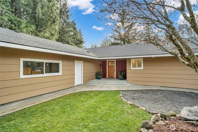 a front view of house with yard