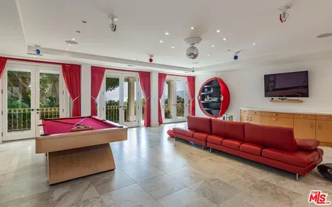 a view of an outdoor space and tennis court