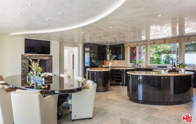 a kitchen with a sink and stove