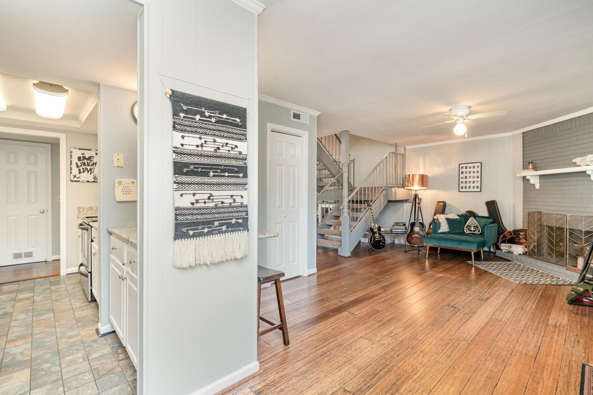4001 Anderson Road, Unit B124 Nashville, TN 37217 - Photo 11 of 36 a living room with furniture and a wooden floor