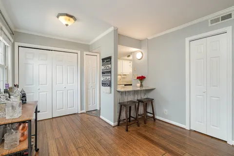 a workspace with furniture and wooden floor