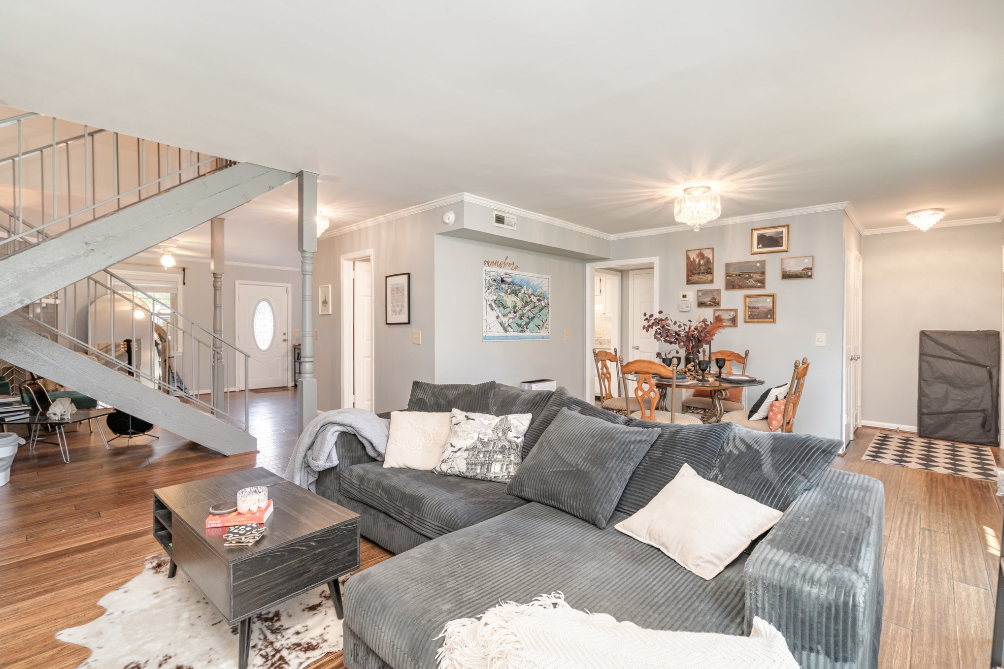 4001 Anderson Road, Unit B124 Nashville, TN 37217 - Photo 6 of 36 a living room with furniture and wooden floor