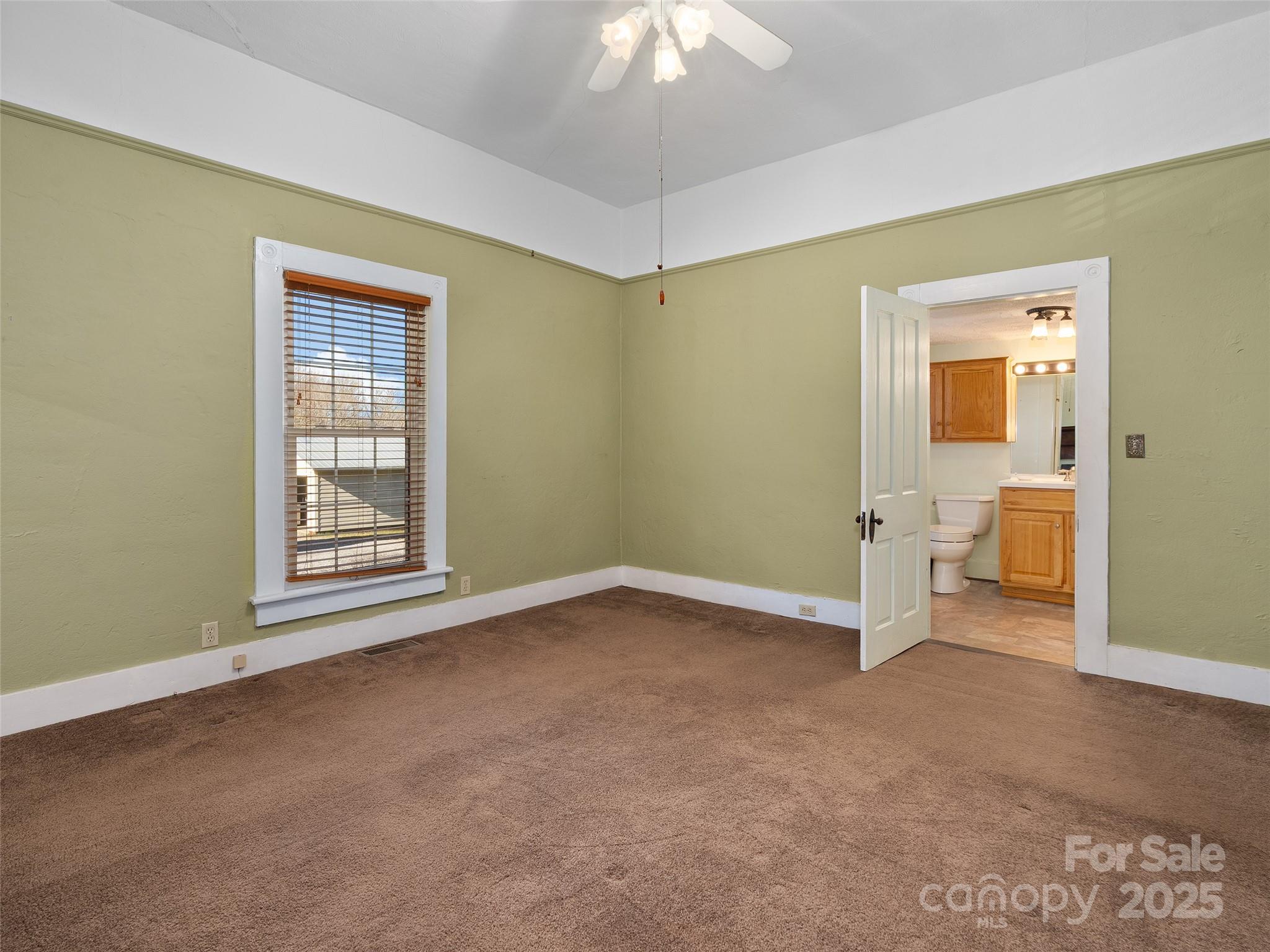 4739 Old Clyde Road Clyde, NC 28721 - Photo 14 of 35 a view of an empty room with a window