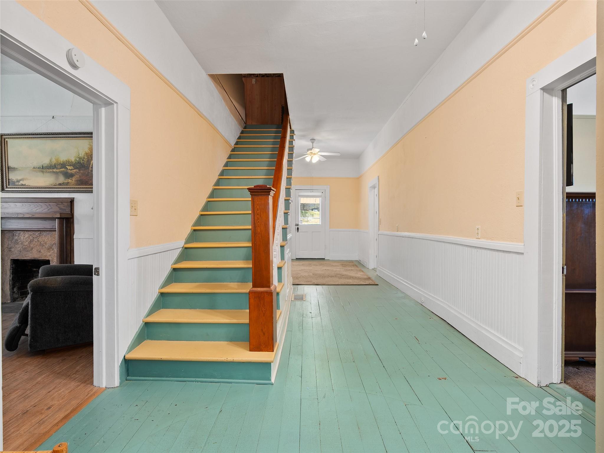 4739 Old Clyde Road Clyde, NC 28721 - Photo 23 of 35 a view of entryway and hall with wooden floor