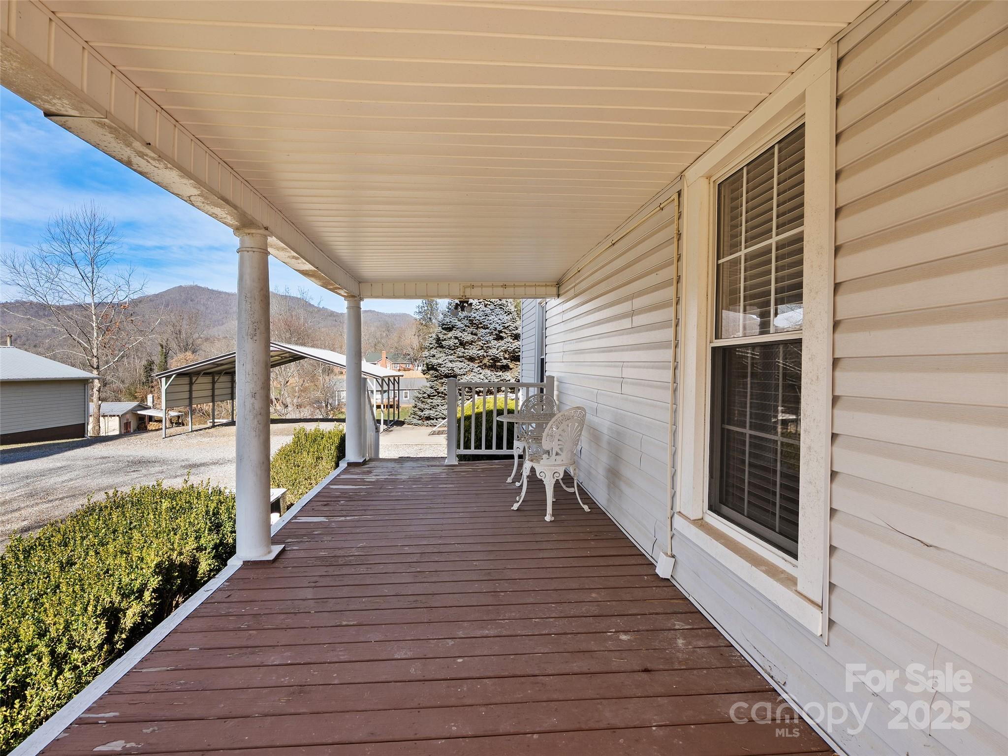 4739 Old Clyde Road Clyde, NC 28721 - Photo 26 of 35 a view of a patio with wooden floor