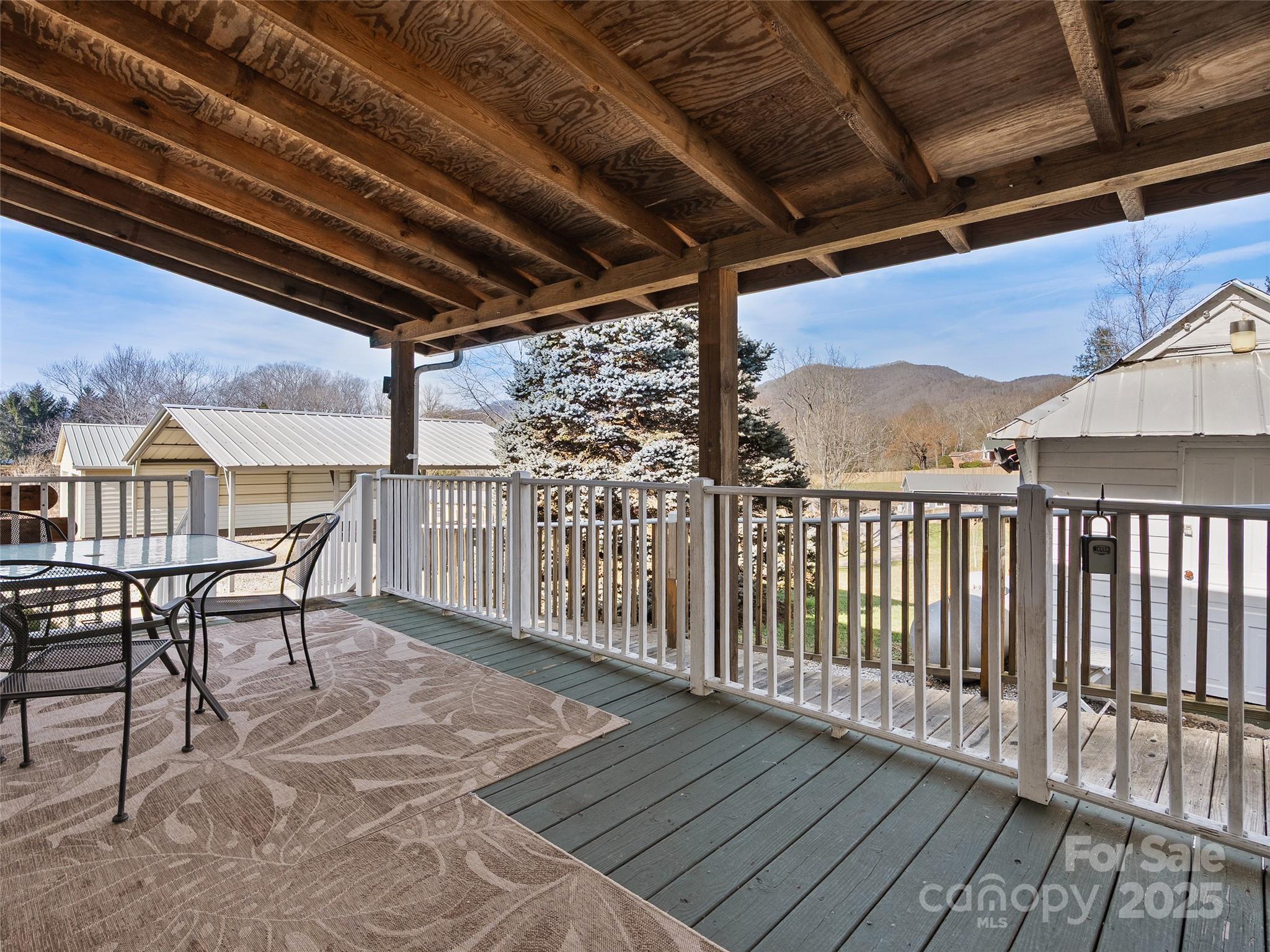 4739 Old Clyde Road Clyde, NC 28721 - Photo 5 of 35 a view of a balcony with furniture