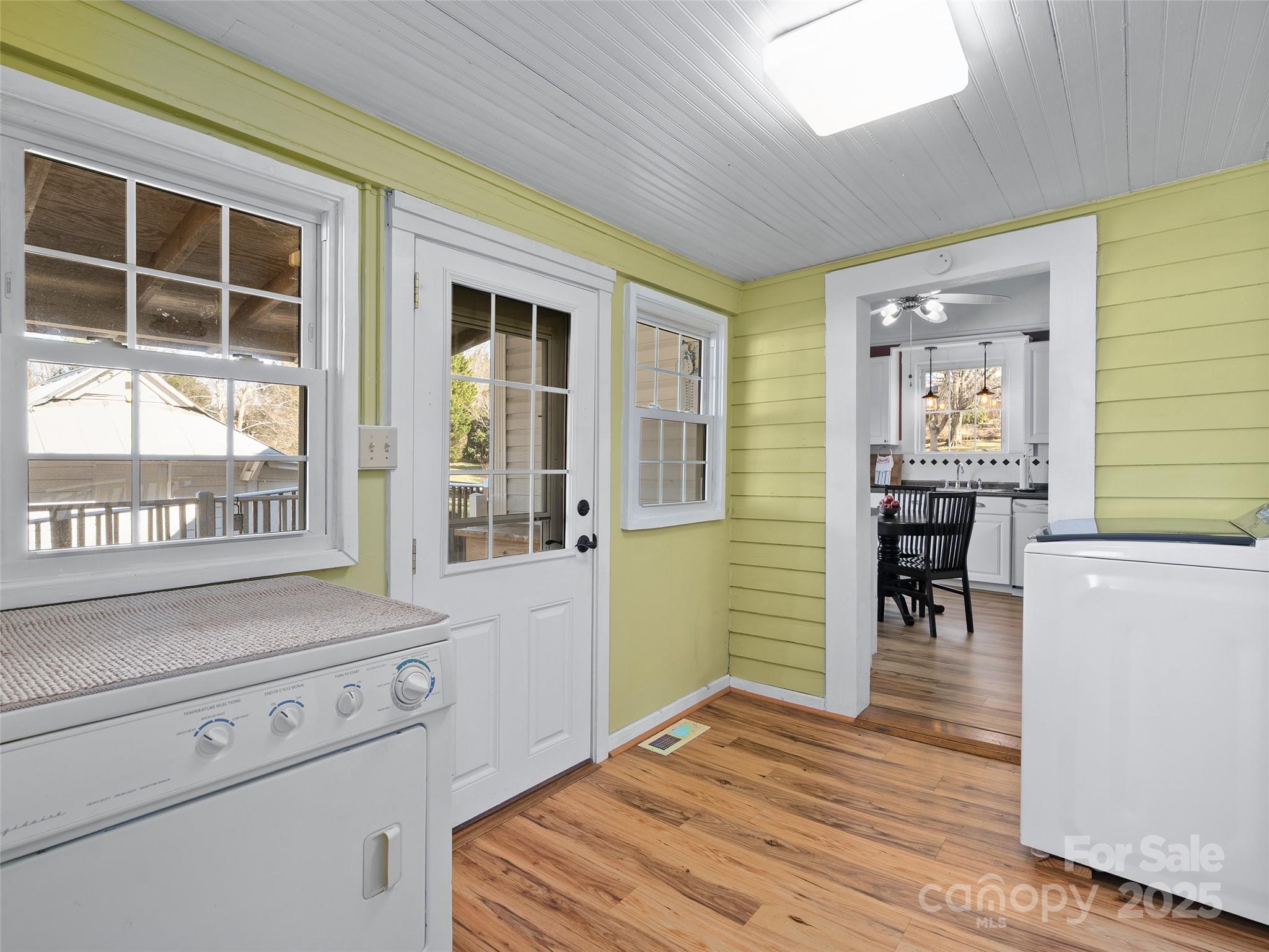 4739 Old Clyde Road Clyde, NC 28721 - Photo 7 of 35 a view of a dining room with furniture window and wooden floor