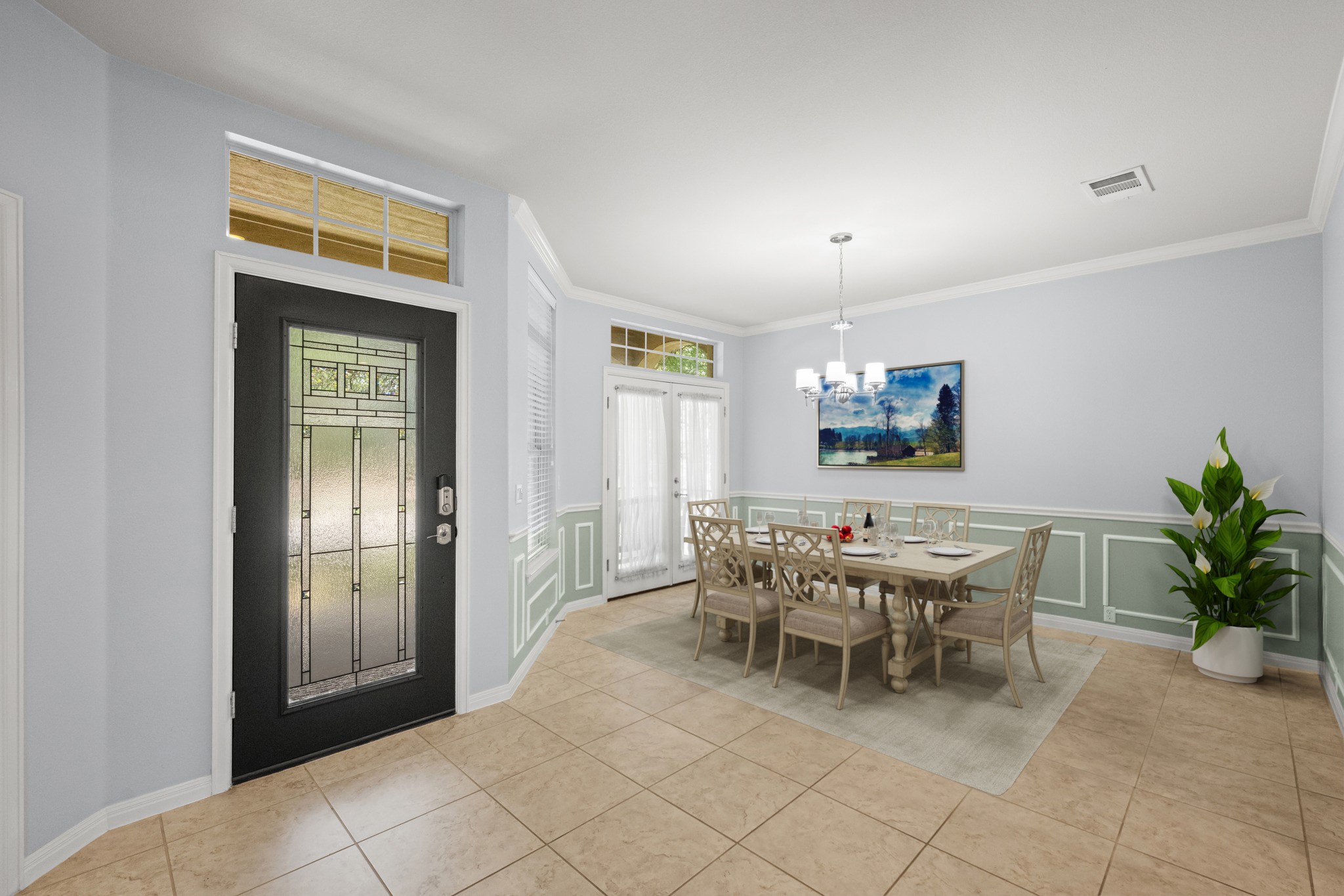 1023 Grassy Field Road Austin, TX 78737 - Photo 6 of 40 Entryway featuring a decorative glass front door with transom window, tile flooring, and crown molding. Virtually staged.
