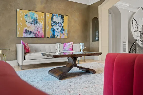 a living room with furniture fireplace and flat screen tv