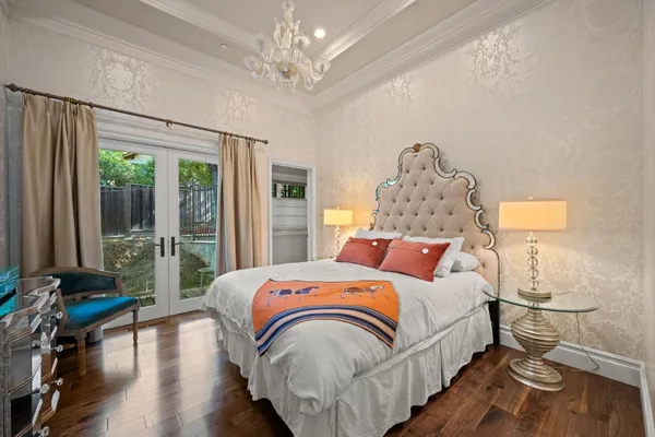 a bathroom with a sink vanity mirror and toilet