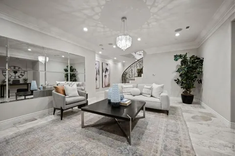 a view of a backyard with sitting area