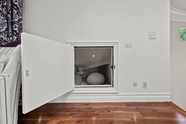 a bathroom with a shower and a glass door