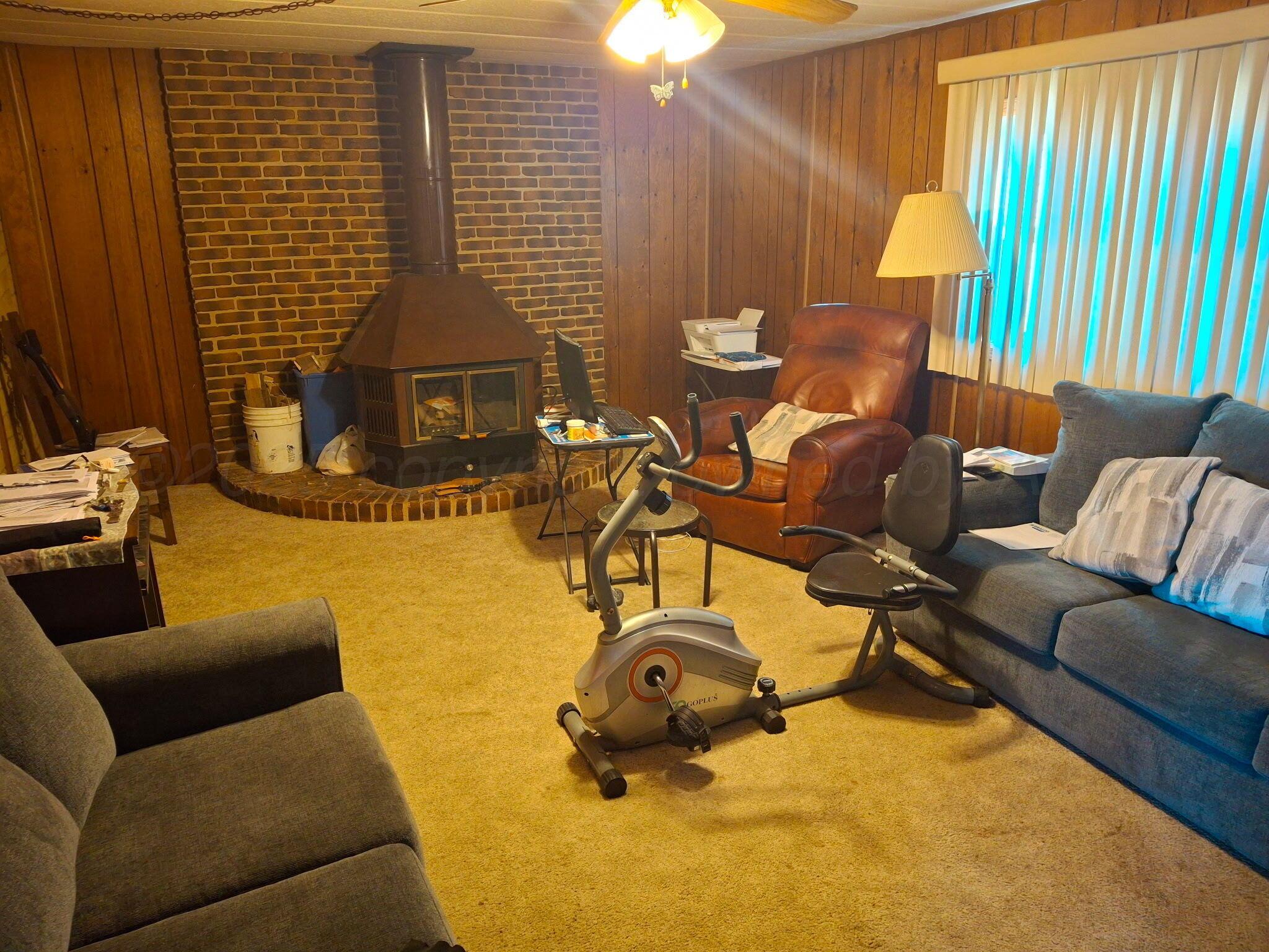 1702 South Baylor Street Perryton, TX 79070 - Photo 28 of 29 a room with furniture and a window