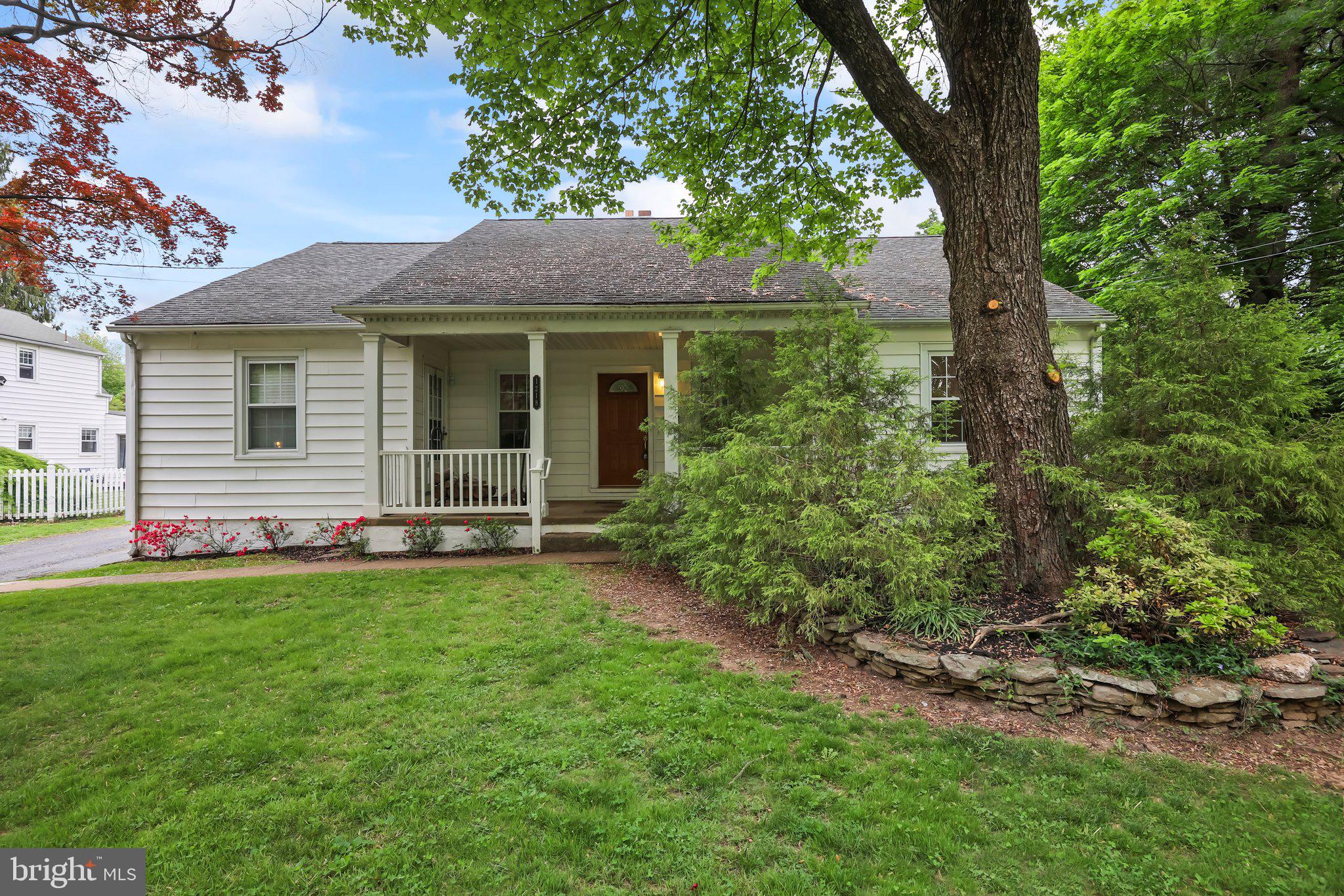 a view of a house with a garden