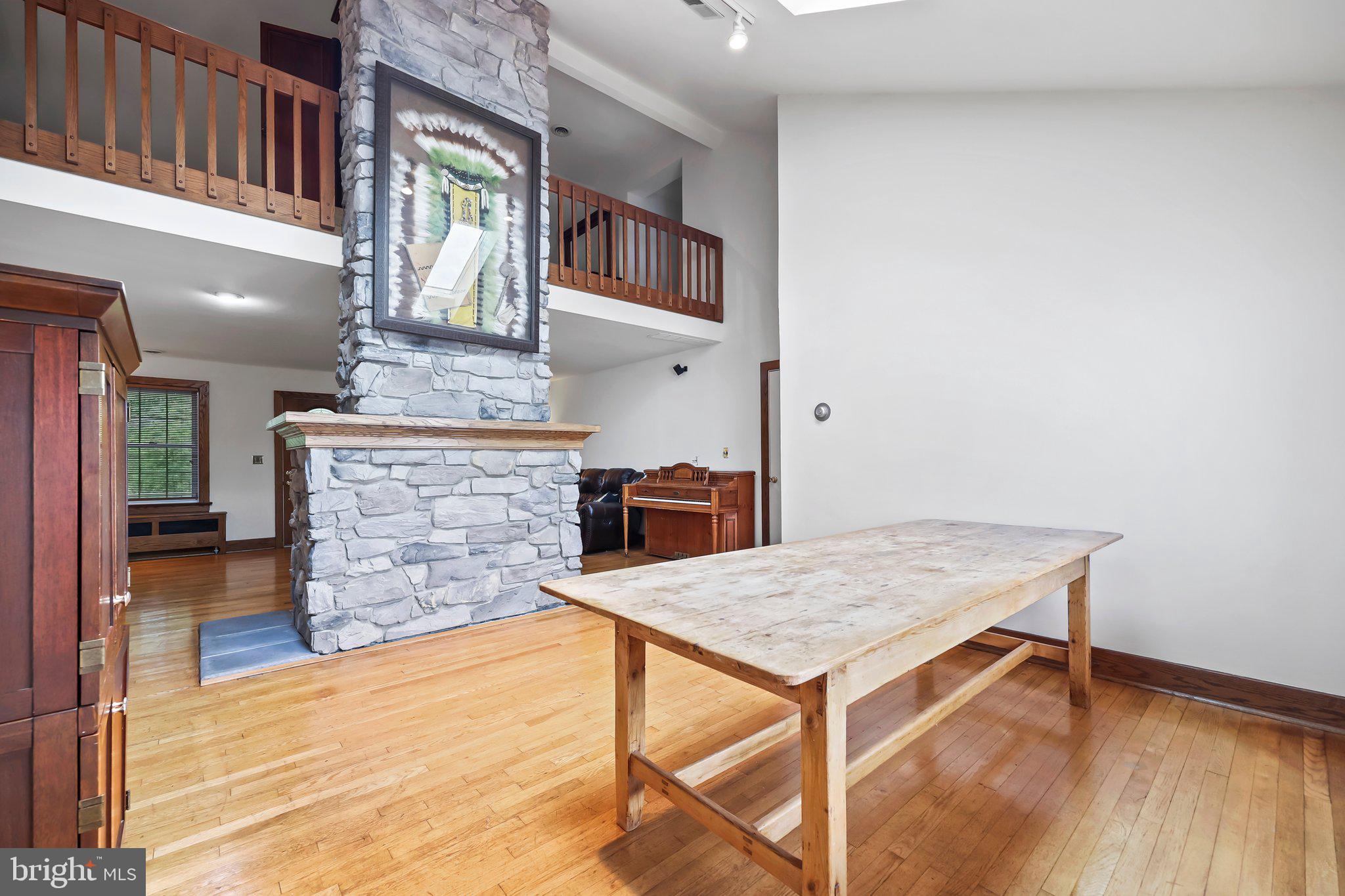 1218 Lower Ferry Road Ewing, NJ 08618 - Photo 15 of 39 a view of livingroom and dining room with wooden floor