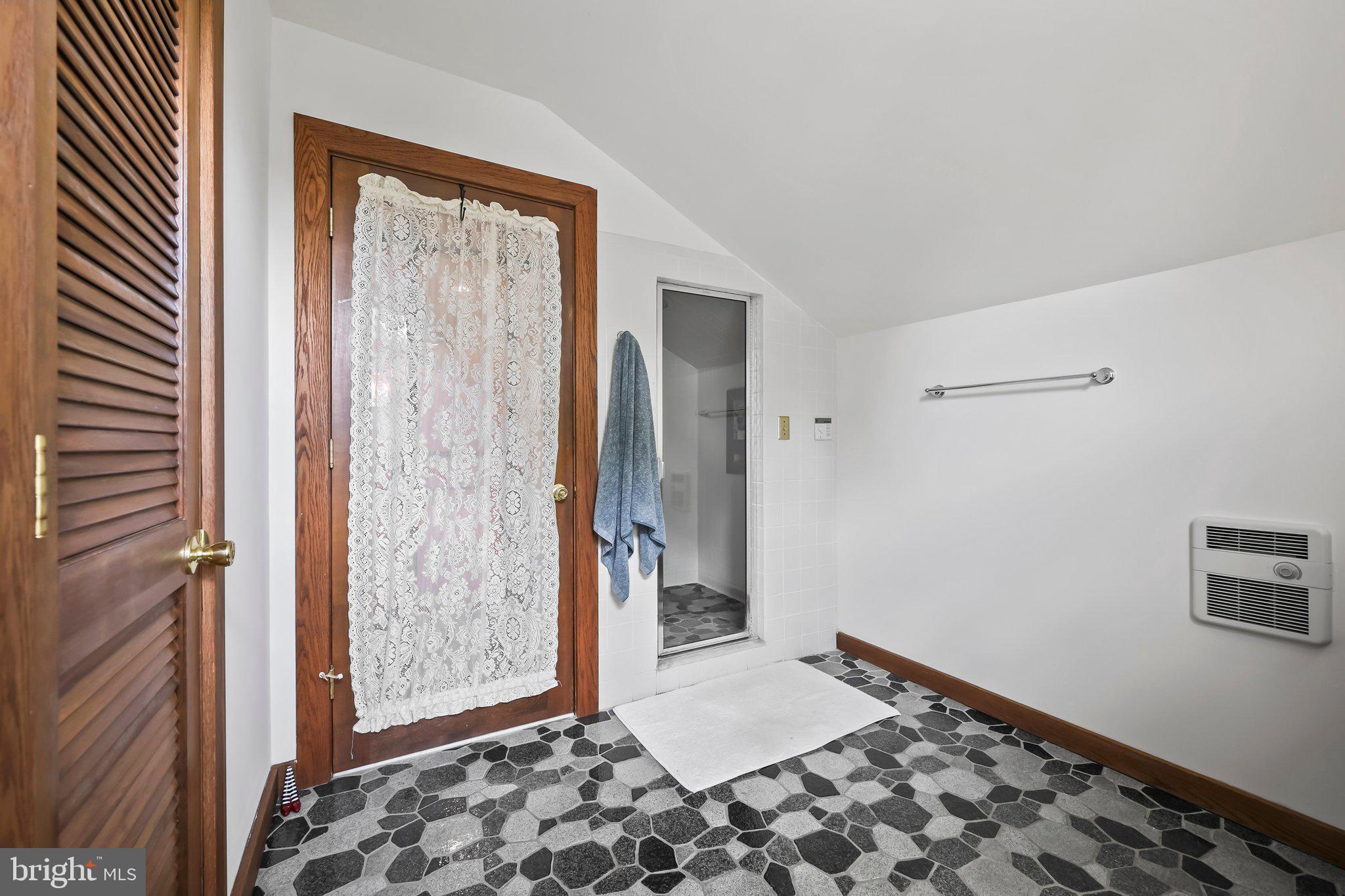 1218 Lower Ferry Road Ewing, NJ 08618 - Photo 23 of 39 a bedroom with a bed and a window