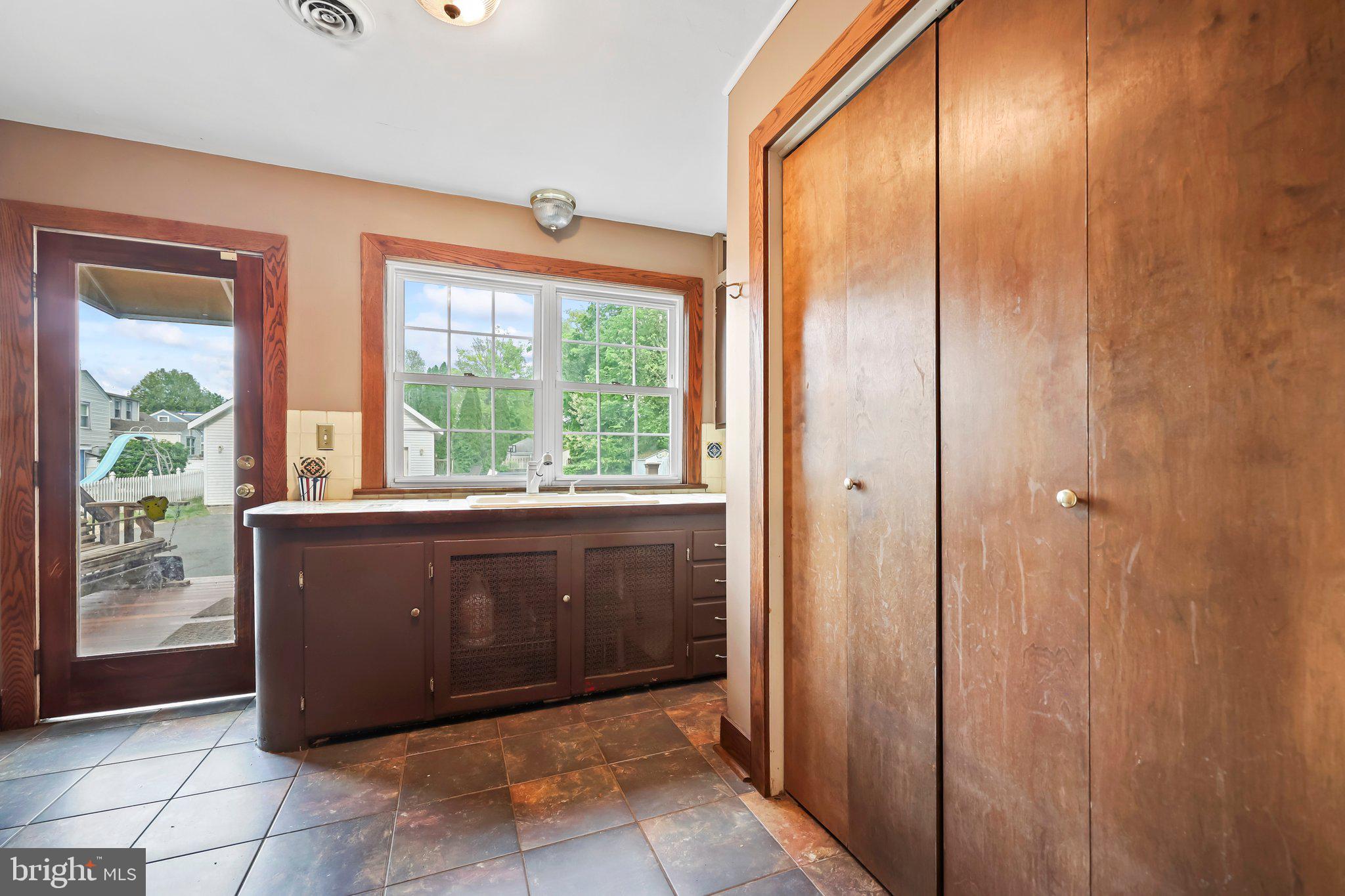 1218 Lower Ferry Road Ewing, NJ 08618 - Photo 30 of 39 a living room with a large window
