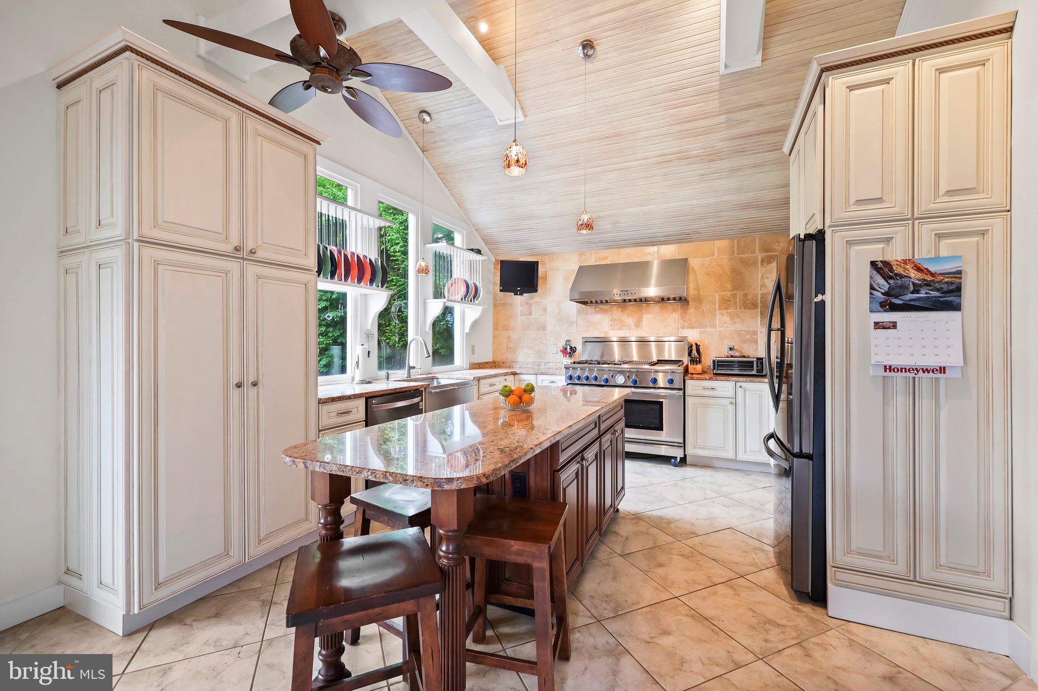 1218 Lower Ferry Road Ewing, NJ 08618 - Photo 3 of 39 a dining room with stainless steel appliances a table and chairs