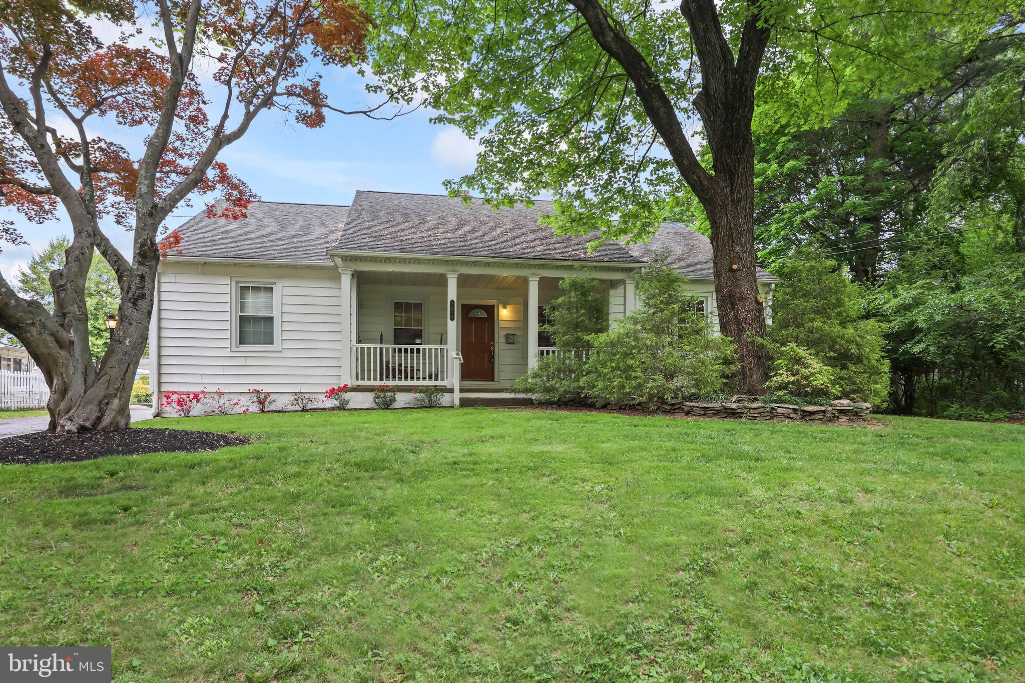 1218 Lower Ferry Road Ewing, NJ 08618 - Photo 36 of 39 a backyard of a house with plants and large tree