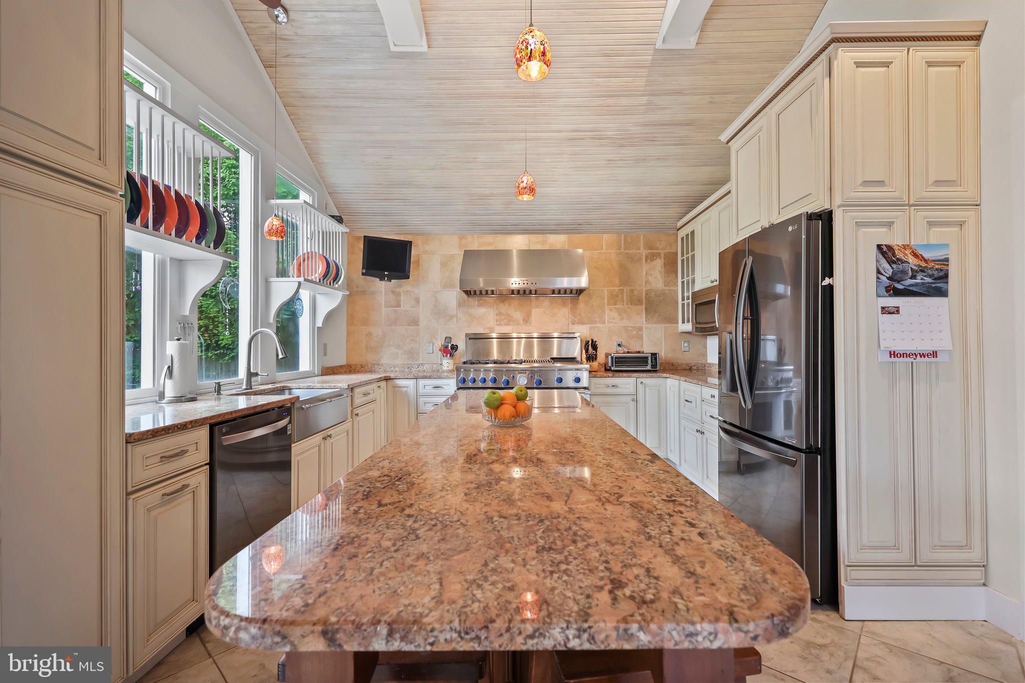 1218 Lower Ferry Road Ewing, NJ 08618 - Photo 6 of 39 a kitchen with stainless steel appliances granite countertop a refrigerator a stove and a sink