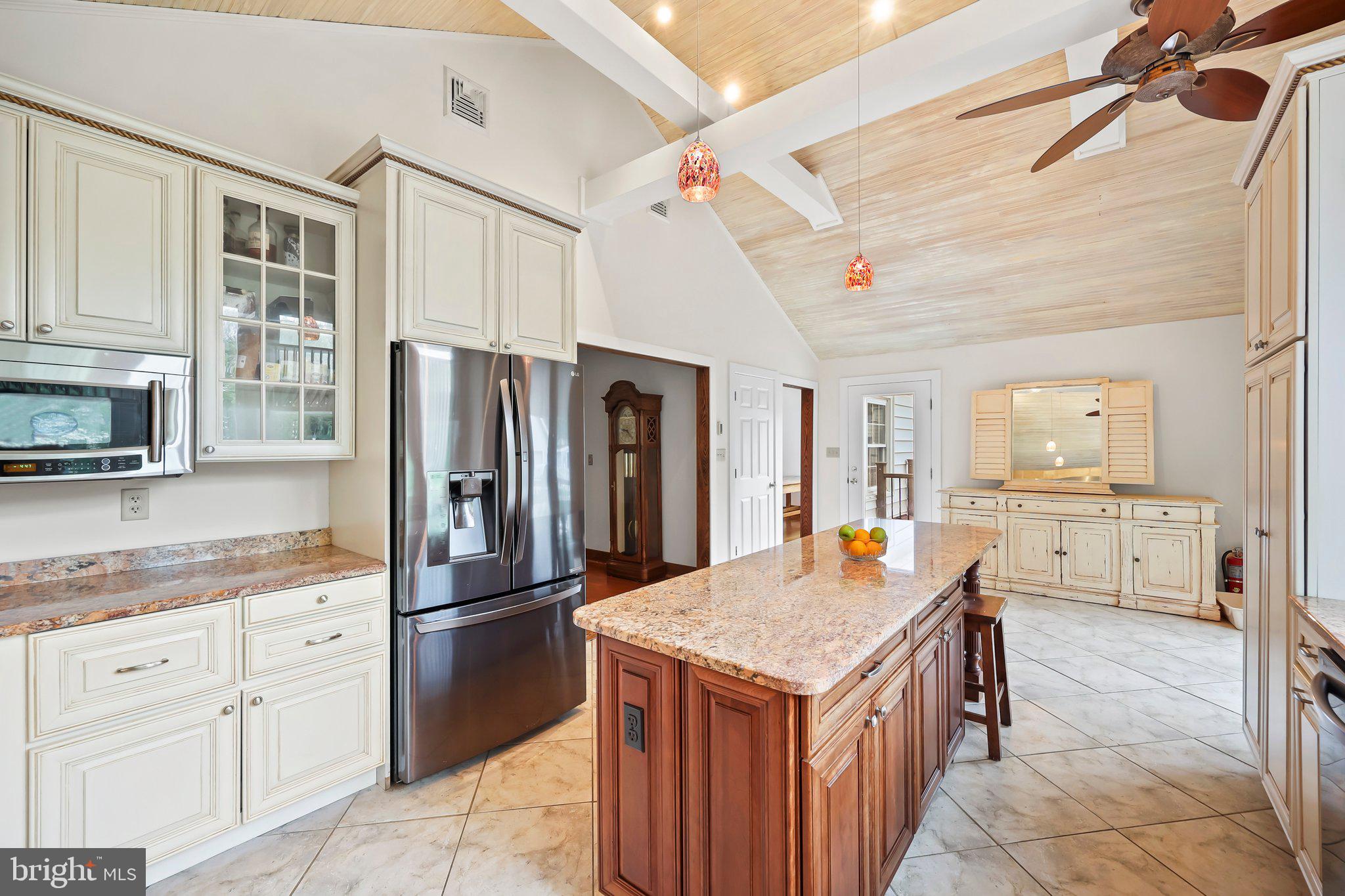 1218 Lower Ferry Road Ewing, NJ 08618 - Photo 9 of 39 a kitchen with a refrigerator a sink and dishwasher