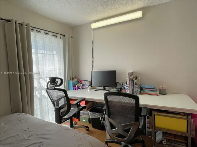 a room with a workspace