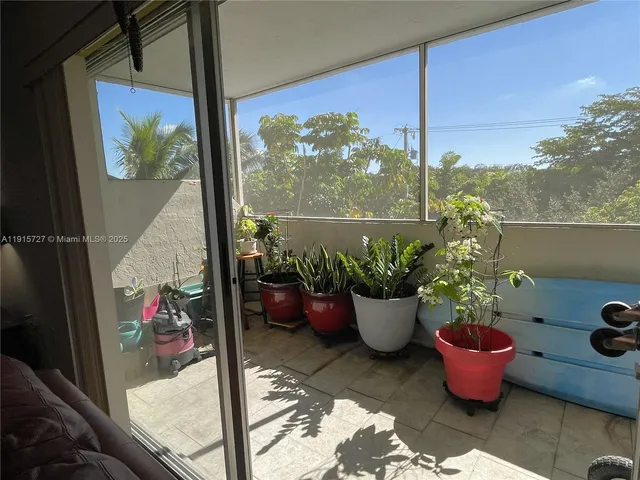 a building outdoor space with potted plants