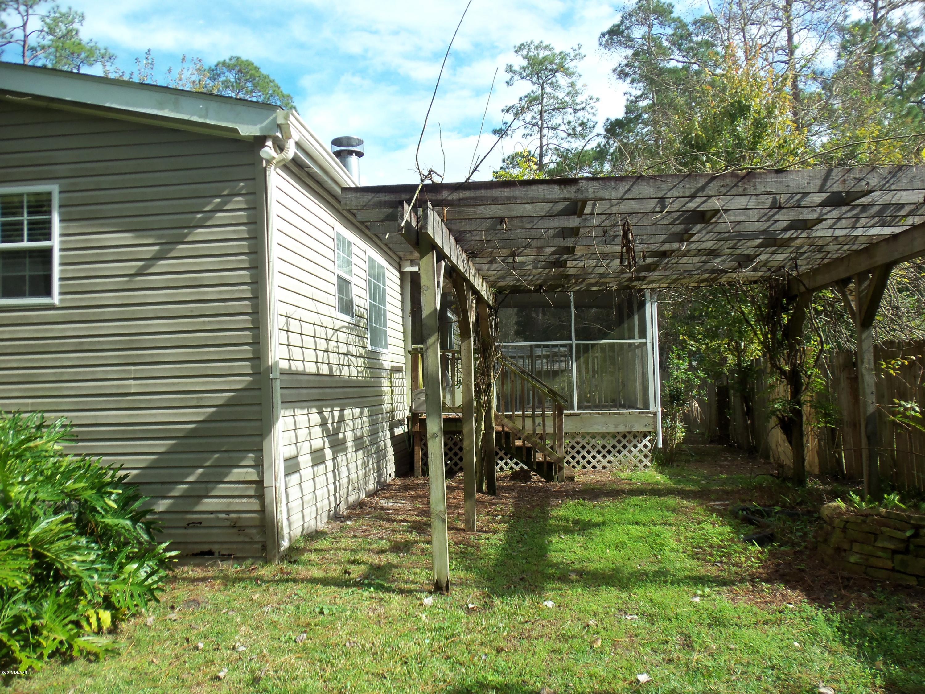 23926 Deer Road Astor, FL 32102 - Photo 14 of 16 Backyard