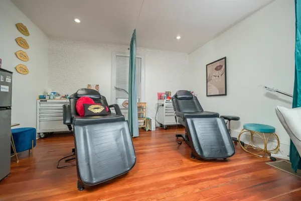 a view of a workspace with furniture and toys