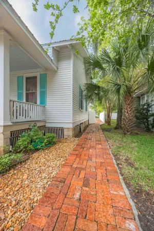 a view of a backyard with a garden