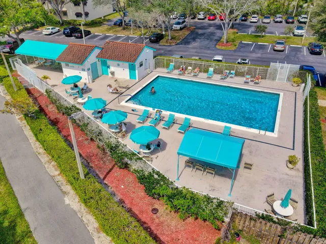 an aerial view of a house with a garden