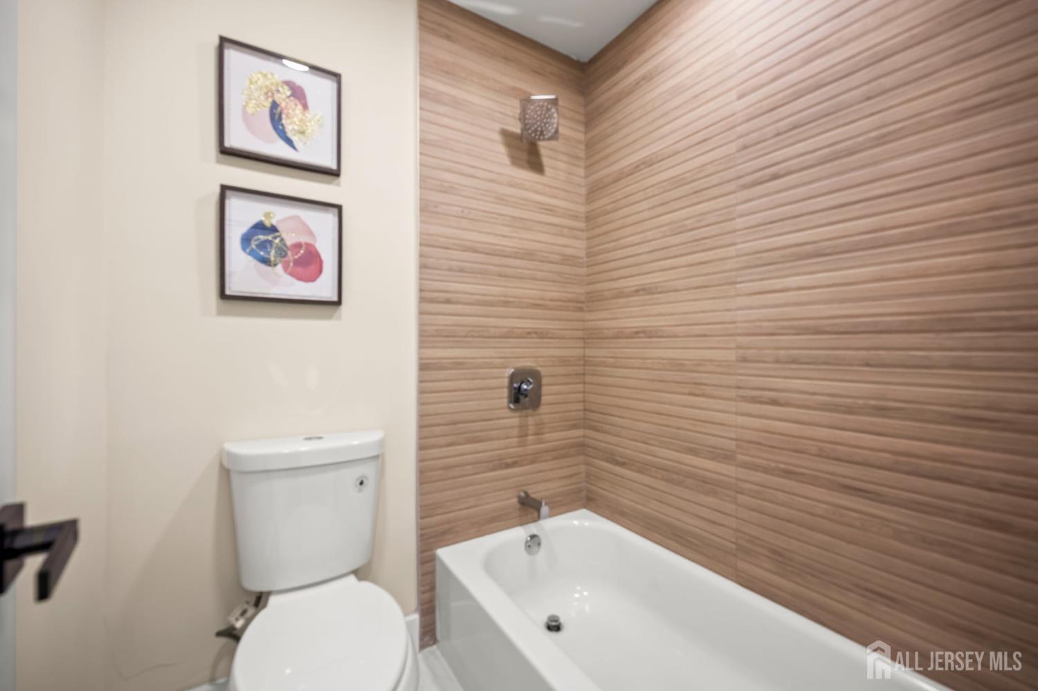 701 Croydon Road, Unit A Monroe Township, NJ 08831 - Photo 21 of 34 a bathroom with a toilet and a shower