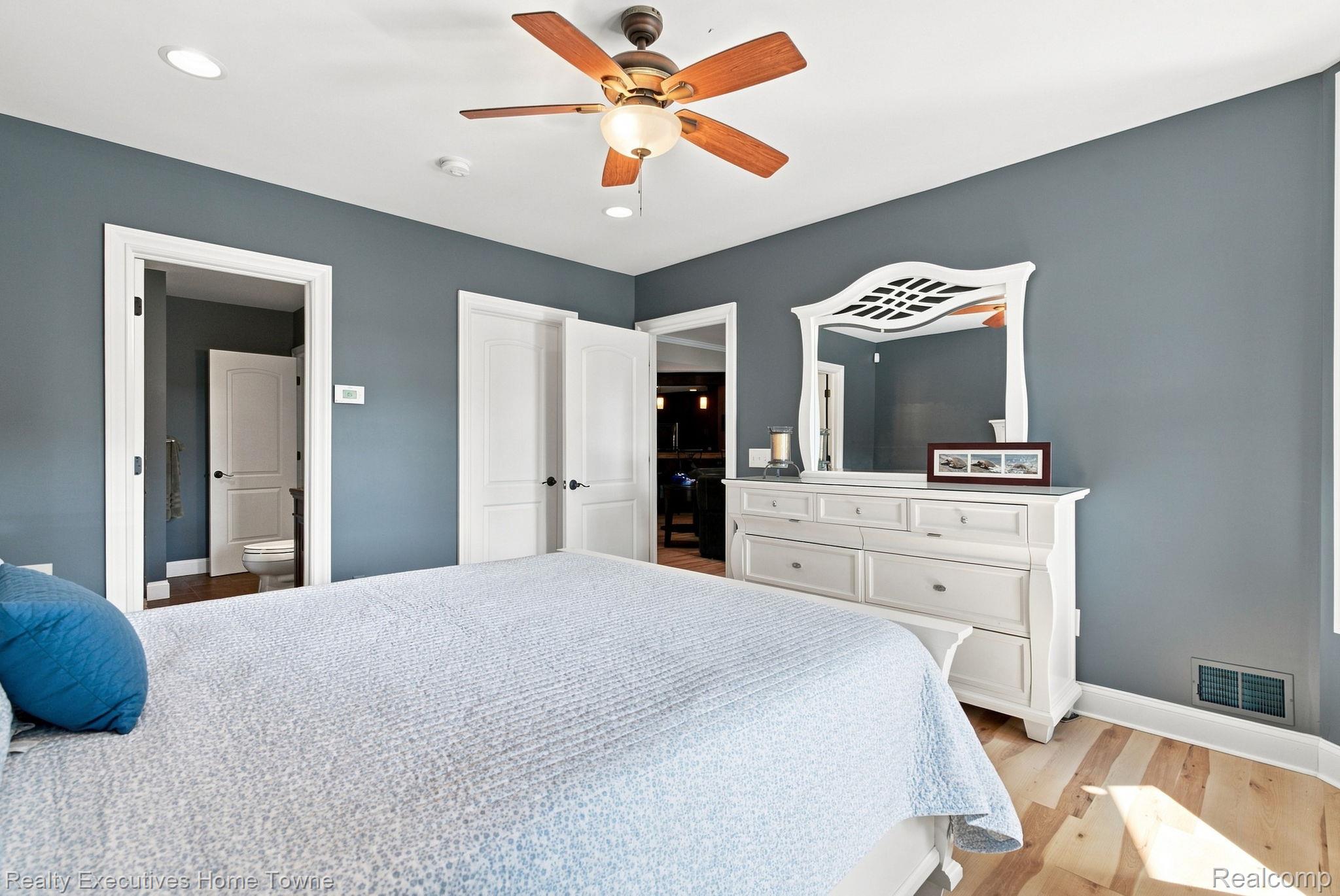 2829 Riverside Drive Port Huron, MI 48060 - Photo 52 of 99 Recessed lighting, wood-finish flooring, ceiling fan, and white trim throughout