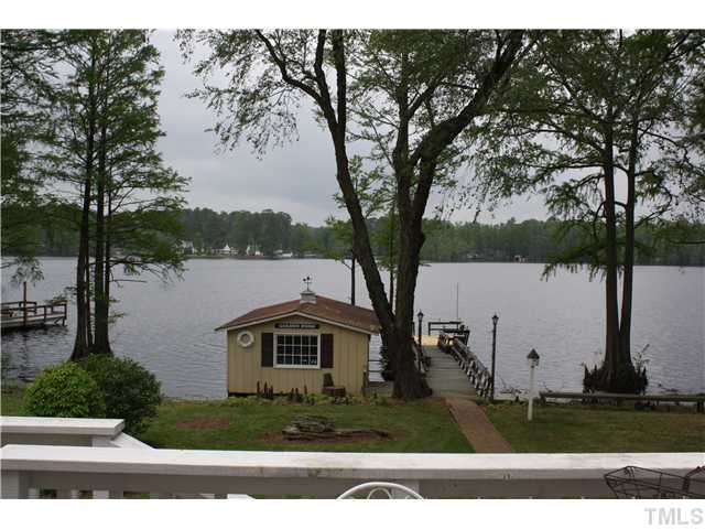 991 Country Club Road Smithfield, NC 27577 - Photo 4 of 16 VIEW of LAKE FROM DECK-Master Suite and Family Rm