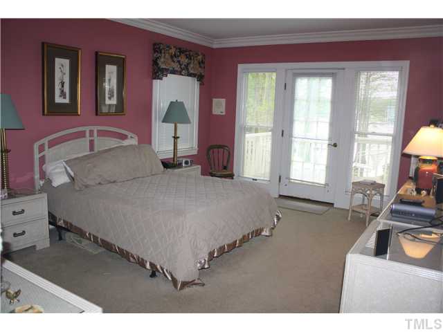991 Country Club Road Smithfield, NC 27577 - Photo 8 of 16 Large MASTER SUITE w/ STUNNING VIEWS OF LAKE