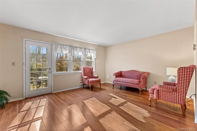 a spacious bedroom with a bed and a fireplace
