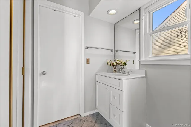 a view of room with wooden floor