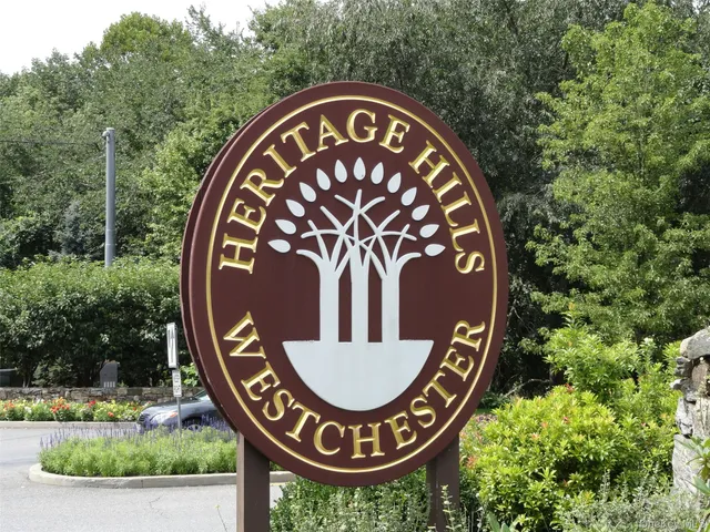 a view of a lake with a sitting space