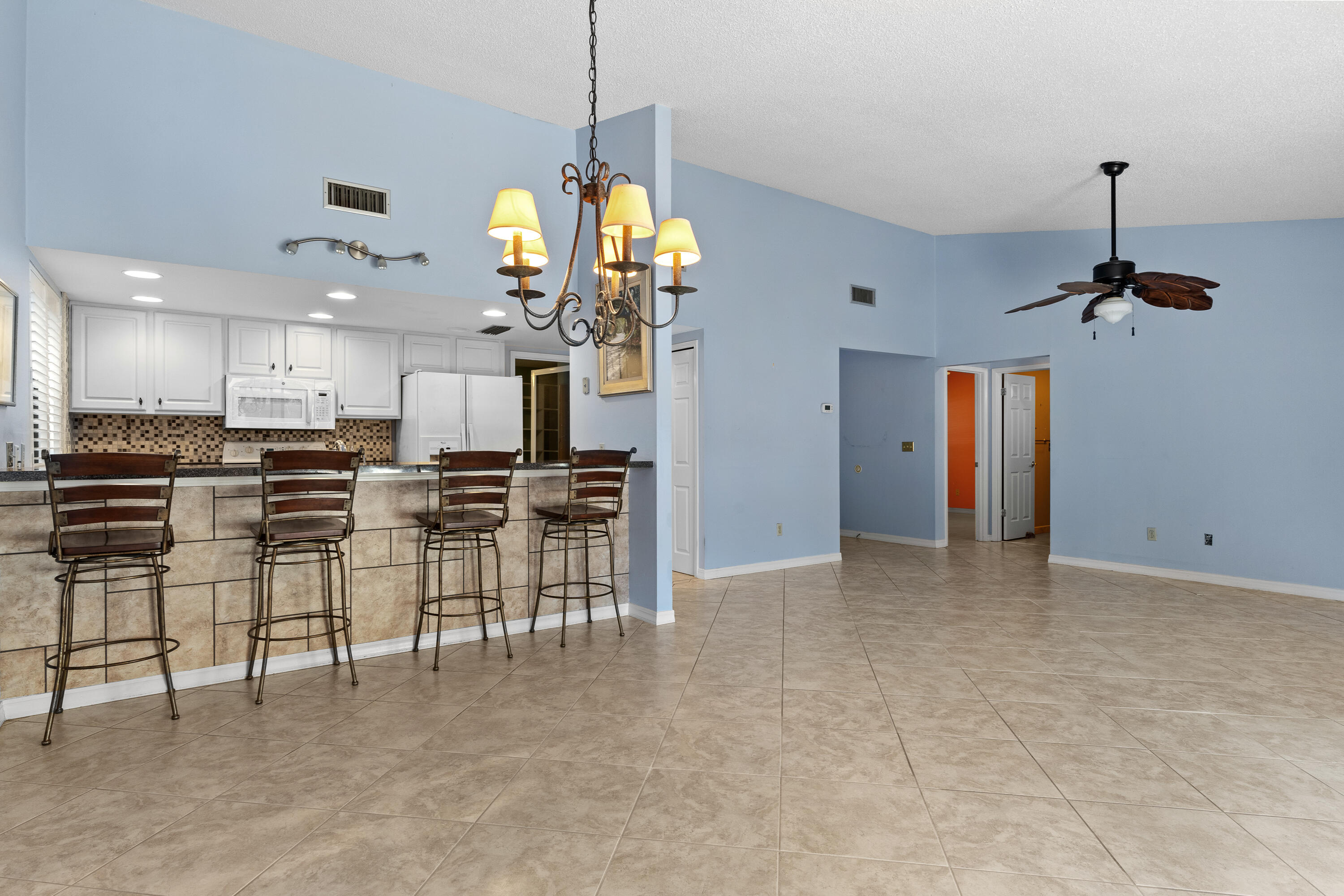351 L'Atrium Drive Miramar Beach, FL 32550 - Photo 11 of 48 a view of a kitchen with furniture and stainless steel appliances
