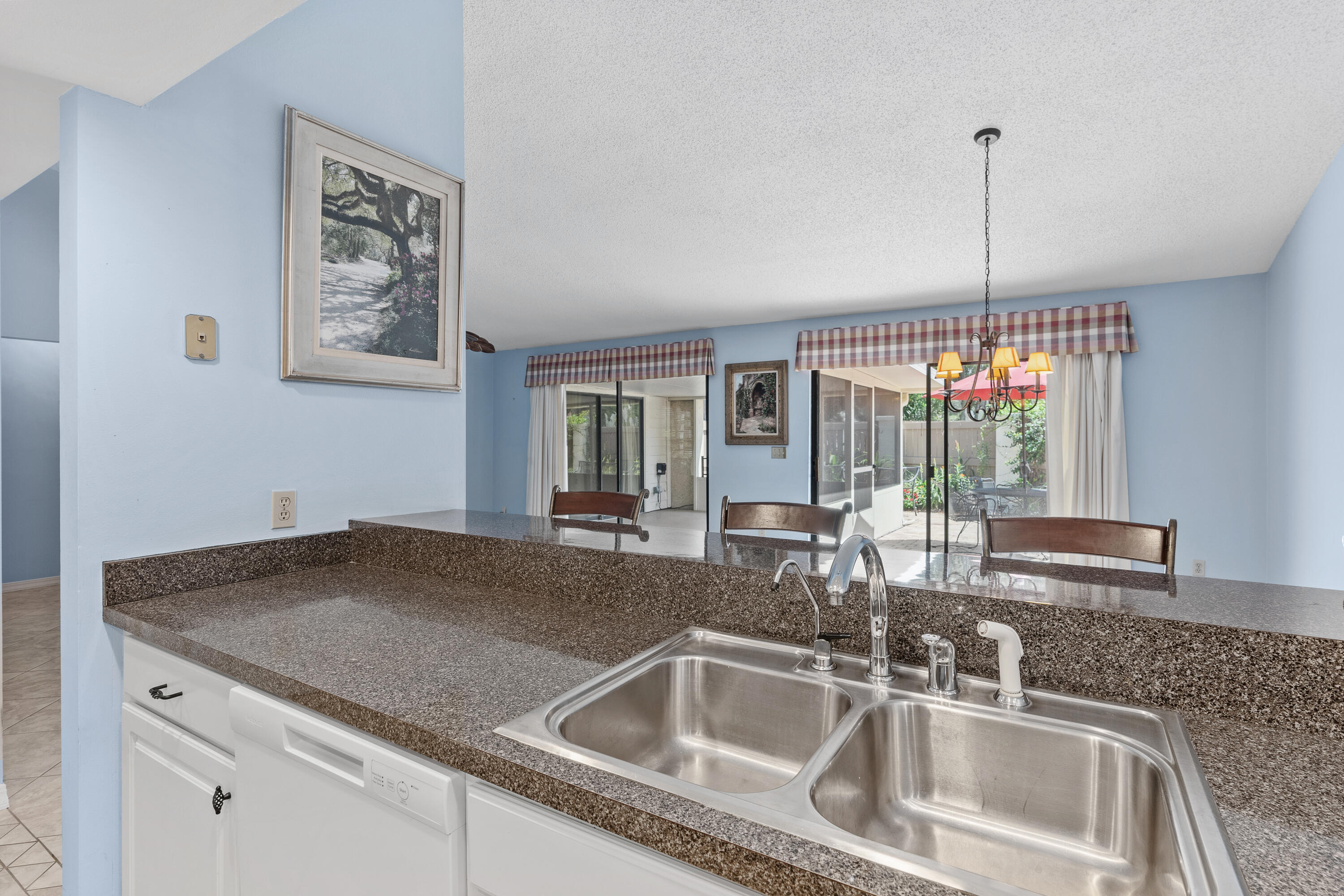 351 L'Atrium Drive Miramar Beach, FL 32550 - Photo 13 of 48 a kitchen with a sink and a window