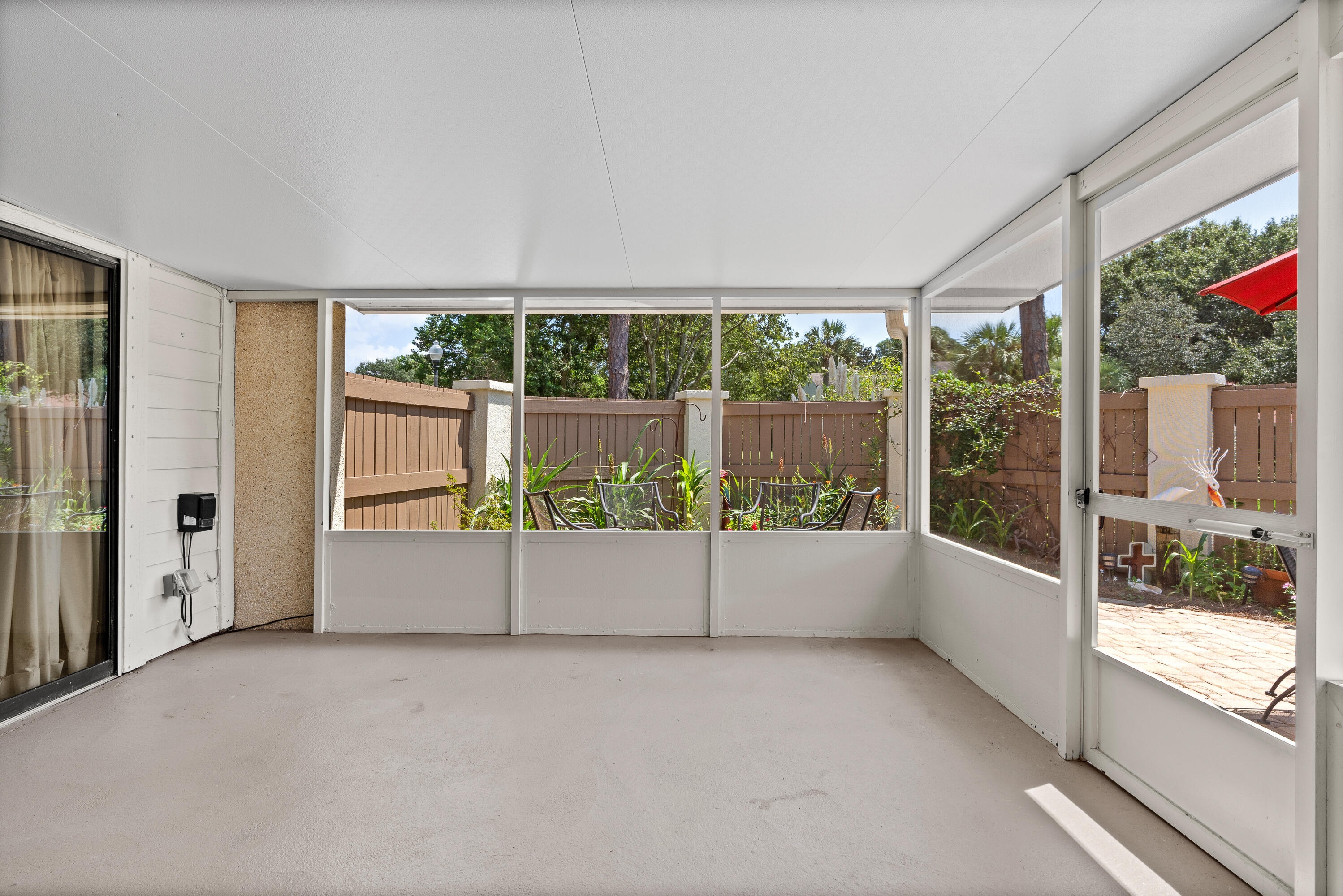 351 L'Atrium Drive Miramar Beach, FL 32550 - Photo 16 of 48 an empty room with wooden floor and windows